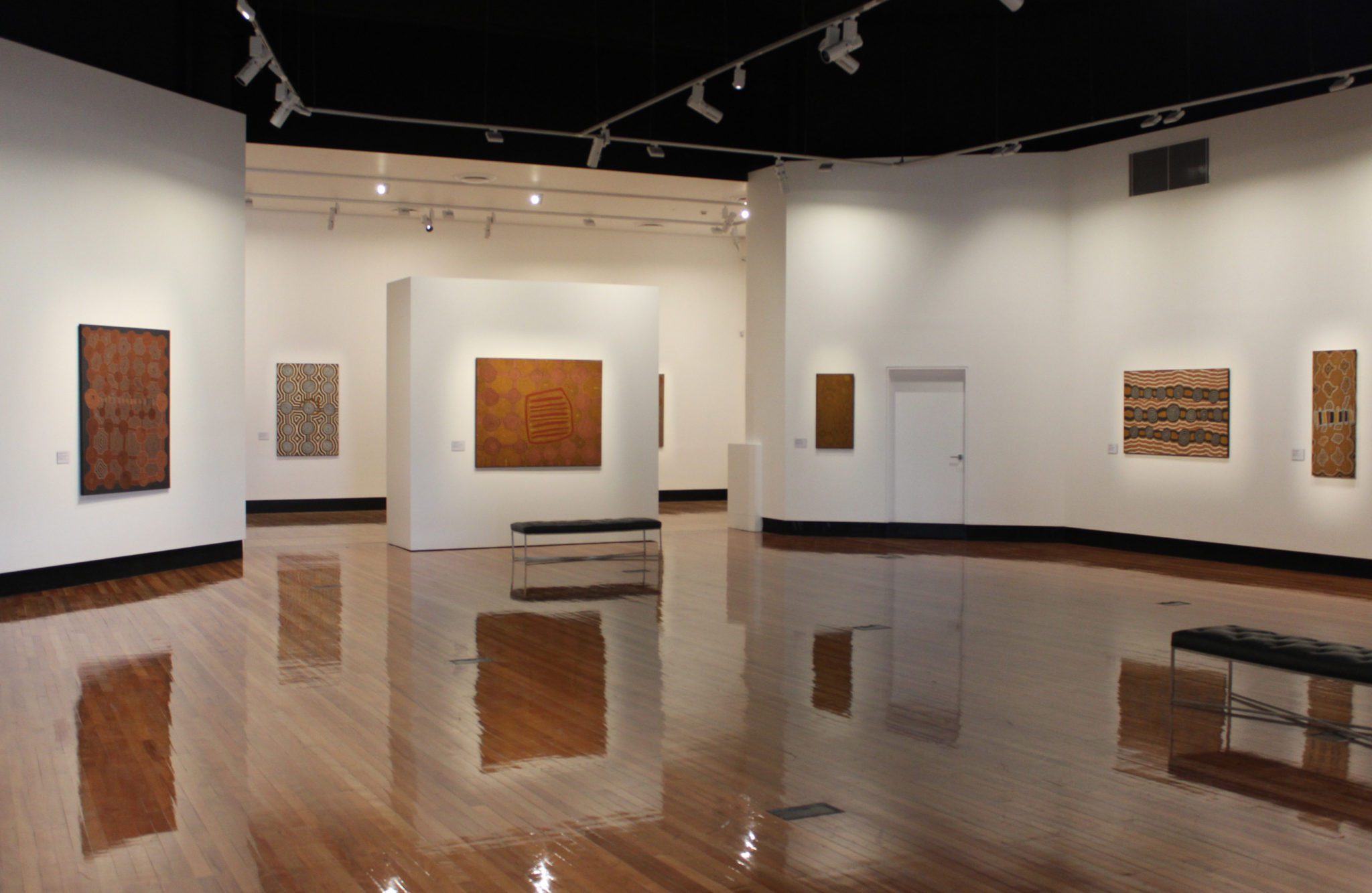 Exhibition documentation of Friendly Country, Friendly People: Art from Papunya Tula, works from the CBUS Collection of Australian Art. Shown in Gallery 1 & 2, Latrobe Regional Gallery, 2020.