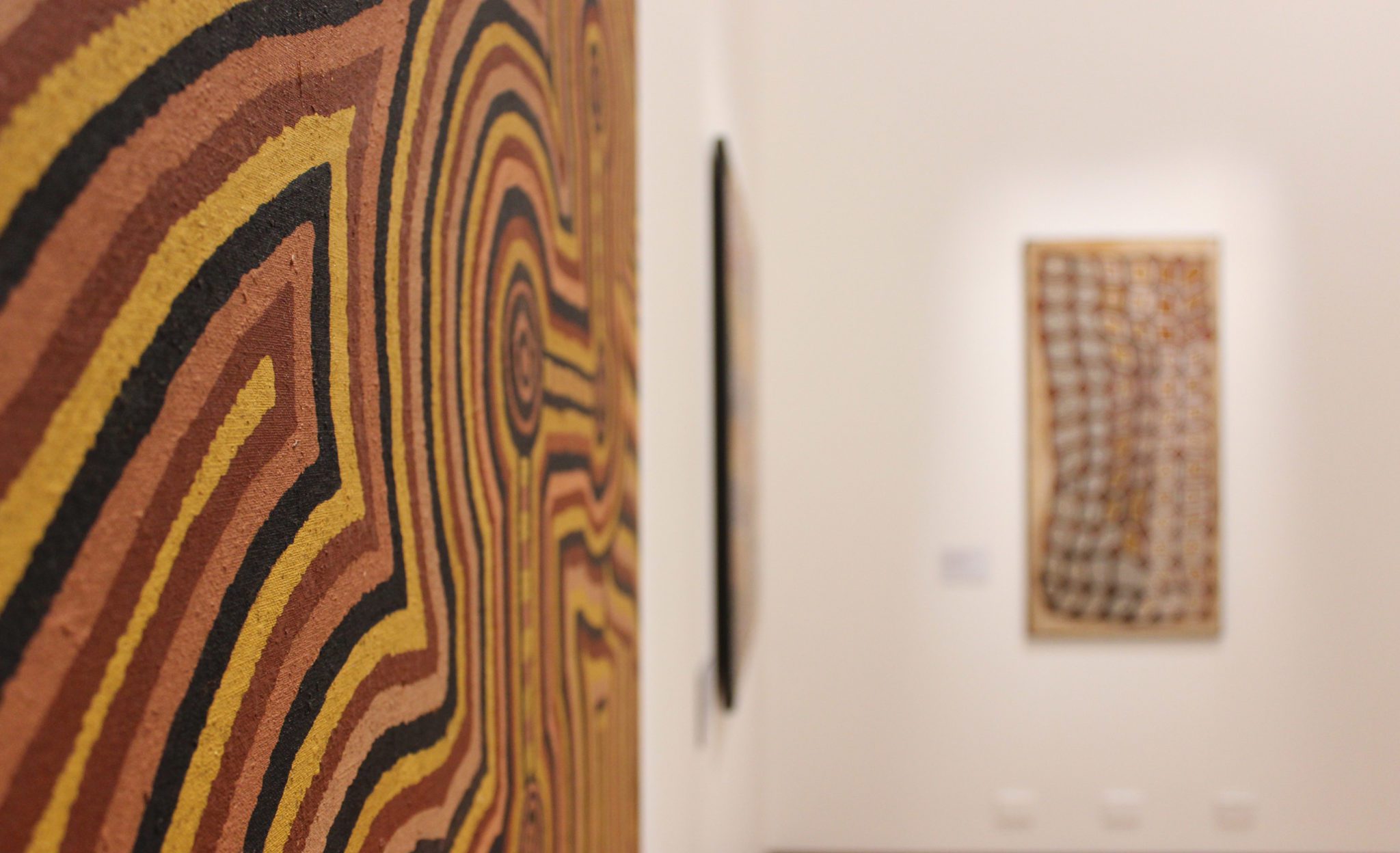Exhibition documentation of Friendly Country, Friendly People: Art from Papunya Tula, works from the CBUS Collection of Australian Art. Shown in Gallery 1 & 2, Latrobe Regional Gallery, 2020.