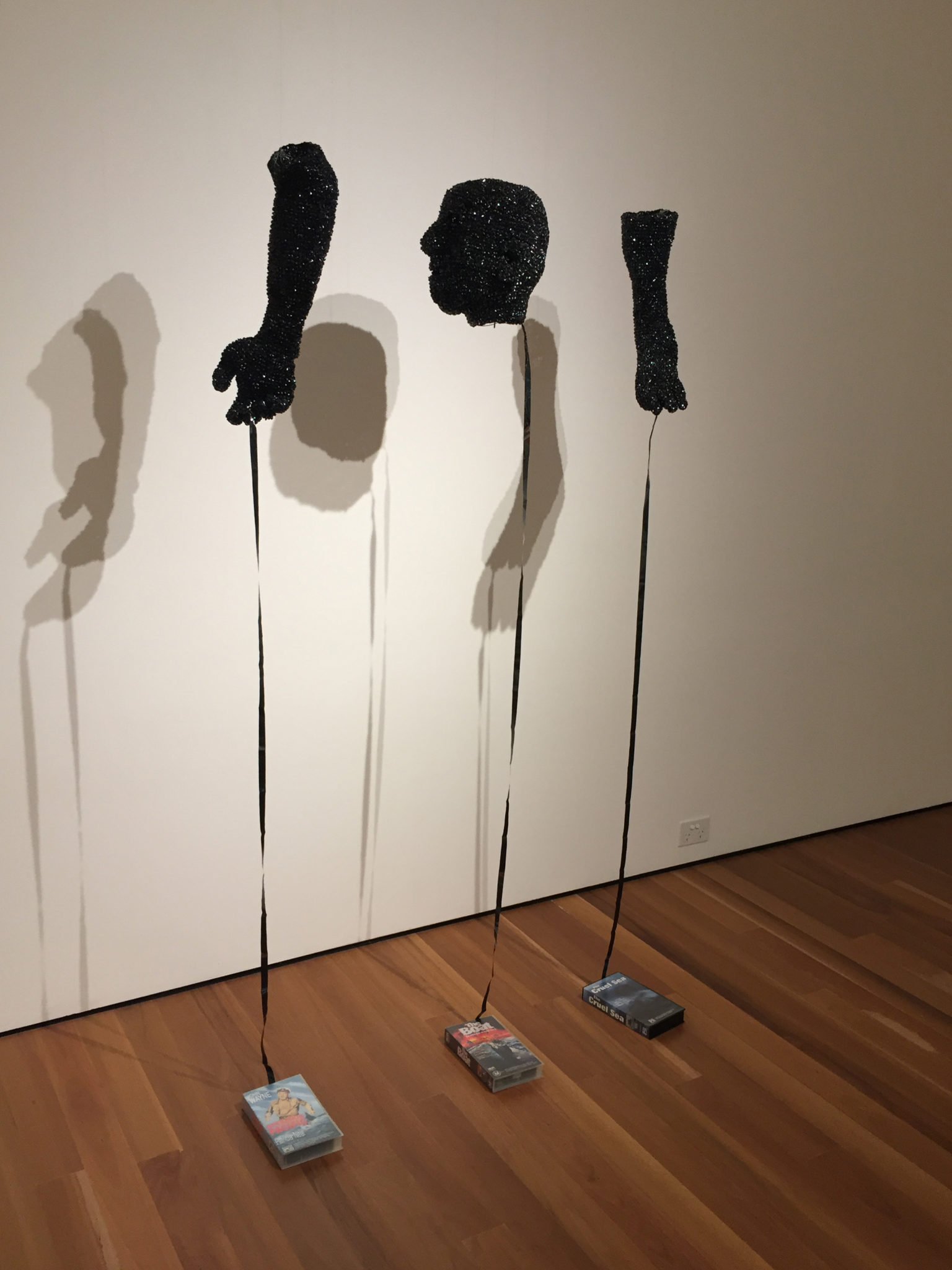 Exhibition documentation of Fiona Hall, All at Sea, 1998, Video tape, plastic, wire, nylon and paper, 3 parts 150 x 200 cm each, Latrobe Regional Gallery Collection, purchased 1998. Shown Gallery 6, Latrobe Regional Gallery 2020.