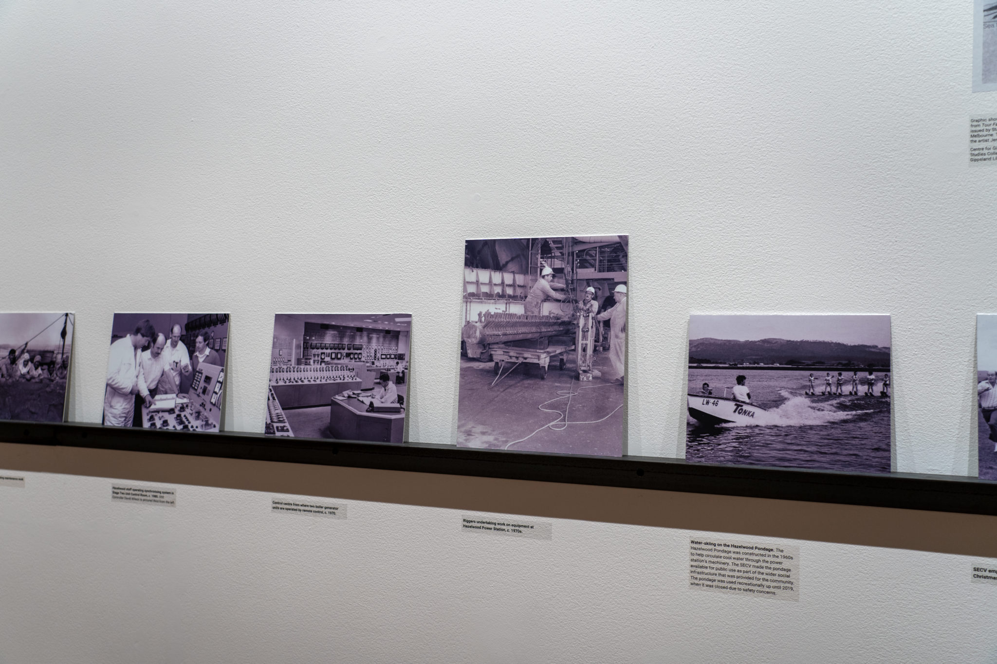 Installation view of HPS timeline, including images selected from Morwell Historical Society archives, courtesy Morwell Historical Society. Shown in Hazelwood, Gallery 4, Latrobe Regional Gallery, 2022. Image by Darryl Whitaker.